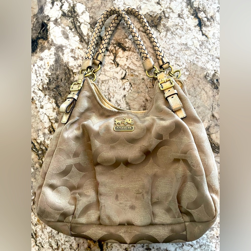 Gold COACH handbag that goes with every outfit